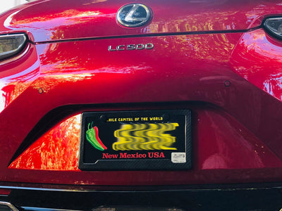 Real carbon fiber license plate frame with 2 holes, angled bottom cutout for stickers on Lexus LC500