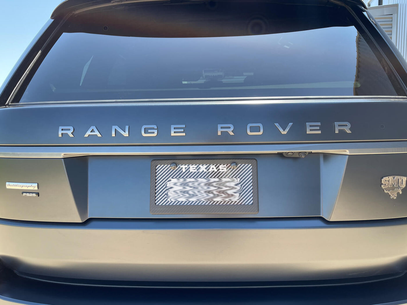 Matte carbon fiber license plate frame on Range Rover Autobiography