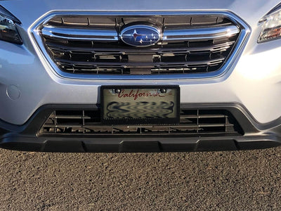 Smoke window carbon fiber license plate frame on Subaru Outback