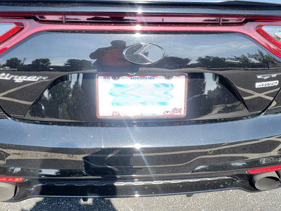 Red carbon fiber aramid fiber/kevlar license plate frame on Kia Stinger GT