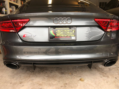 Real carbon fiber license plate frame with 2 holes, angled bottom cutout for stickers on Audi RS7