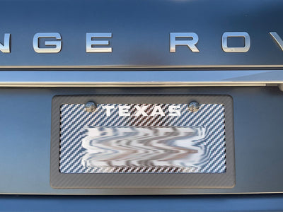 Matte carbon fiber license plate frame on Range Rover Autobiography