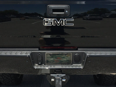 Smoke window carbon fiber license plate frame on GMC truck