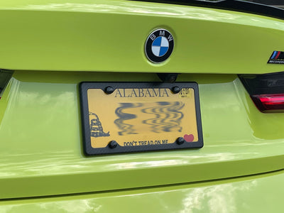 Matte carbon fiber license plate frame on 2021 BMW M3 Competition