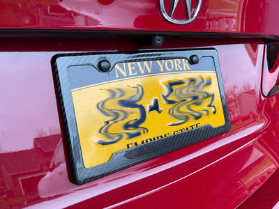 Real carbon fiber license plate frame with 2 holes, angled bottom cutout for stickers on Acura TLX A-Spec