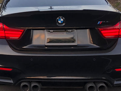 Smoke window carbon fiber license plate frame on BMW M4