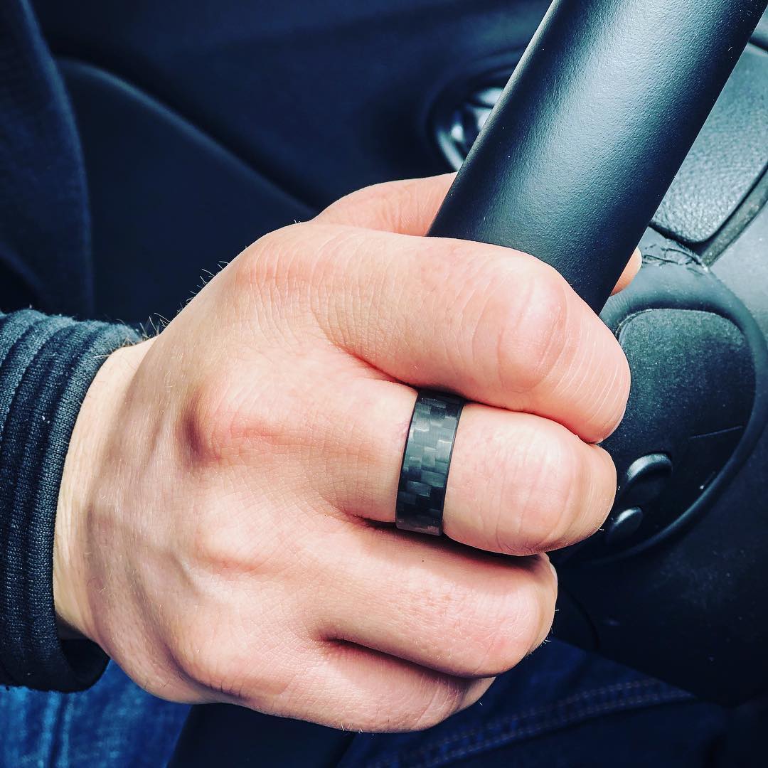 Carbon fiber ring on hand